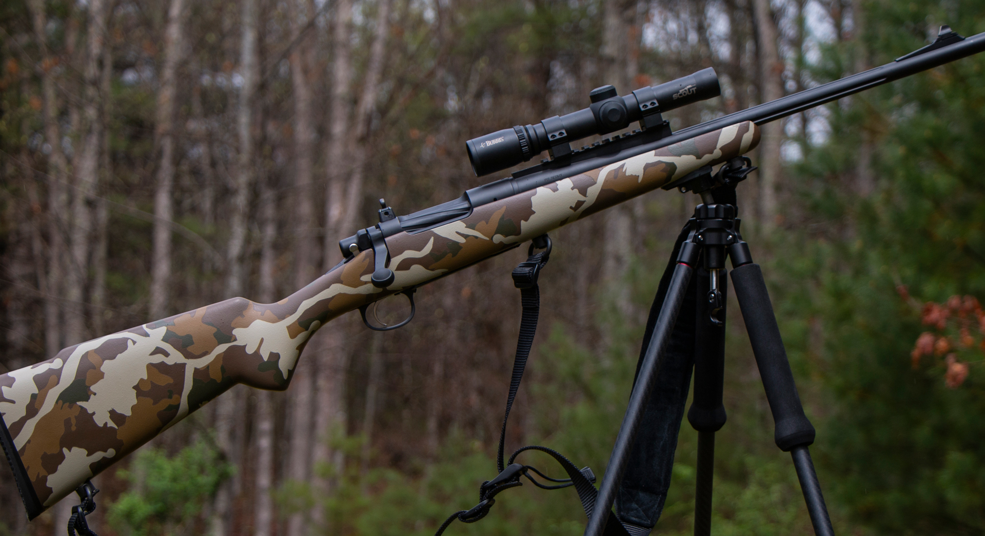 scout rifle on tripod
