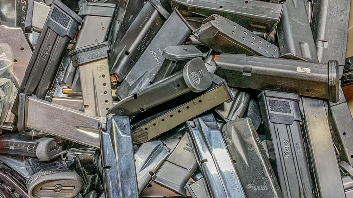 pile of gun magazines