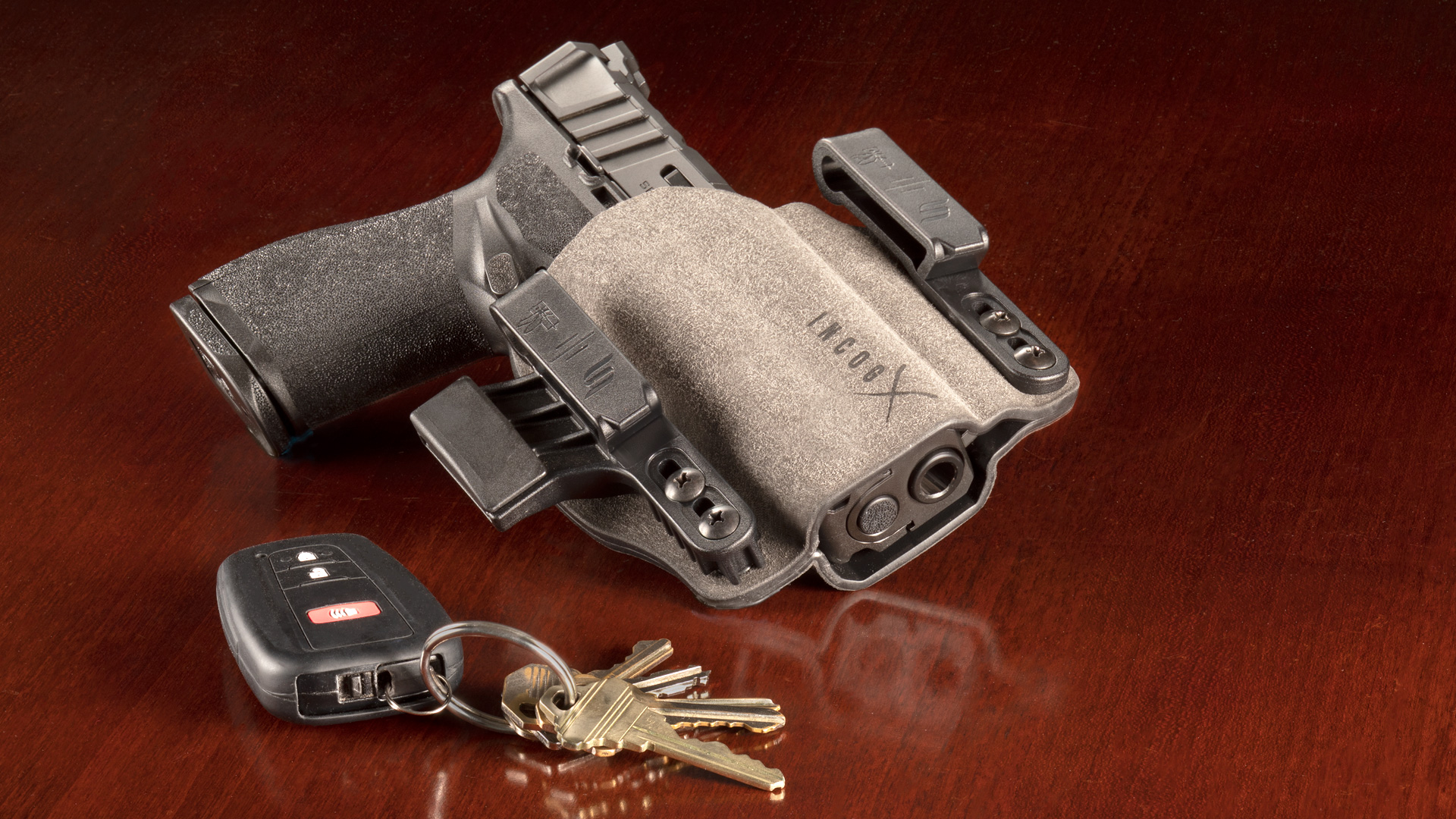 pistol in holster on desk