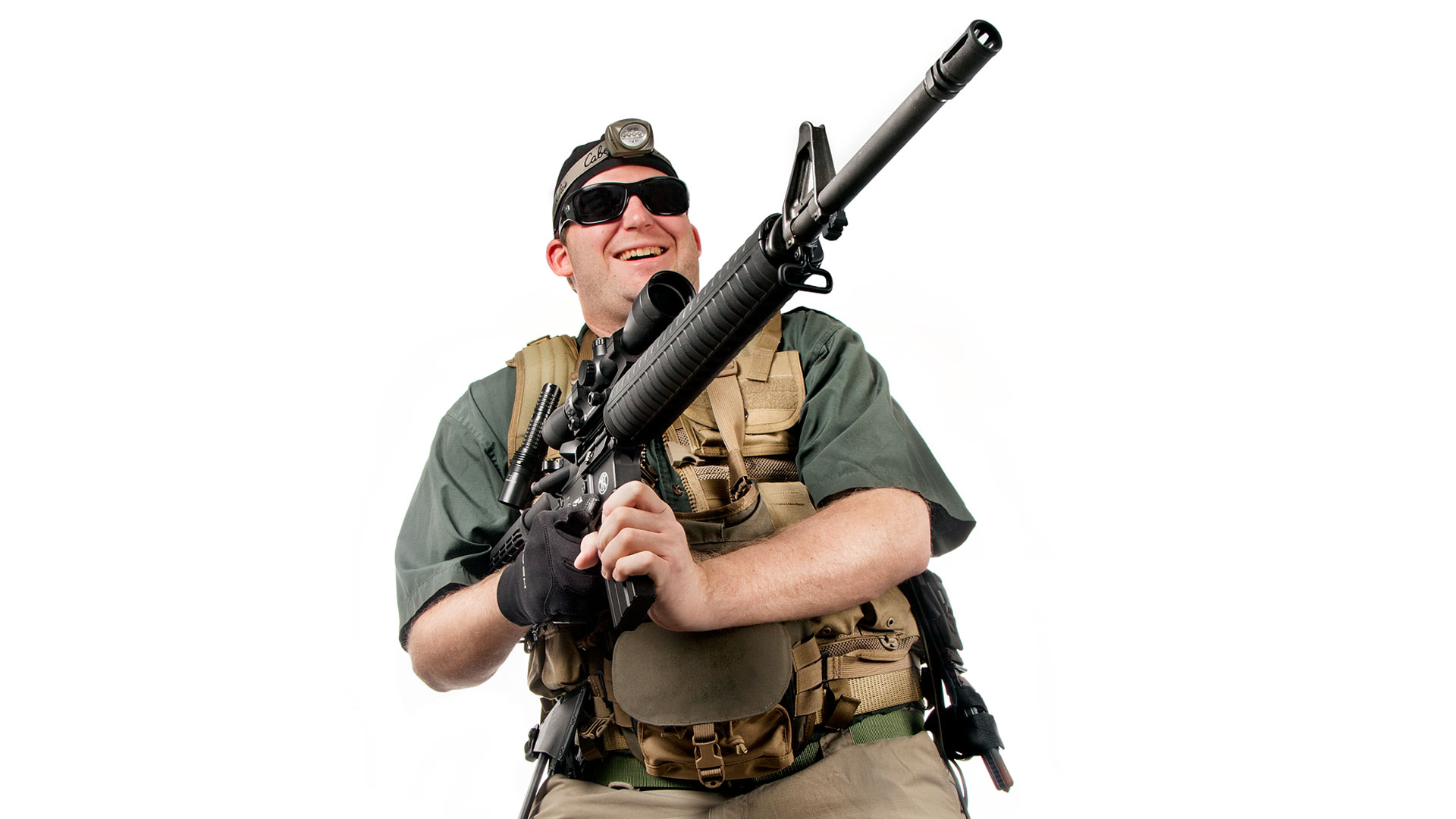 shooter in tactical gear with rifle